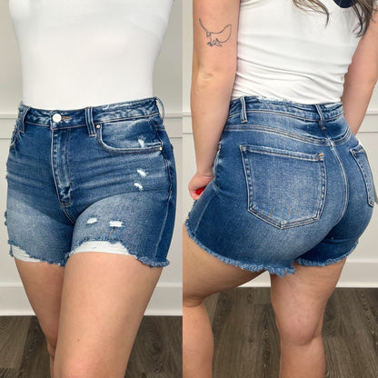 Shorts bleus délavés à taille haute, ourlet effiloché, Risen Marina