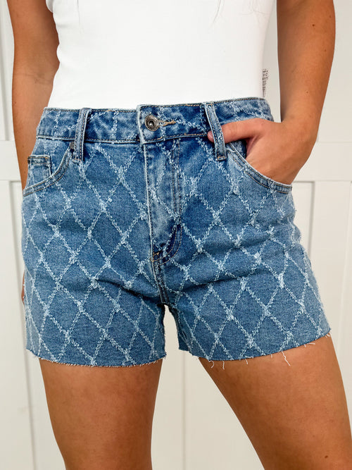 Short Saige Linda en jean bleu délavé taille haute et ourlet brut