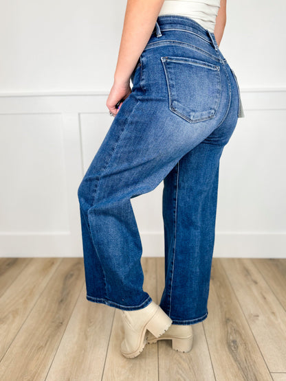 Jean large en denim foncé Risen Maeve taille haute avec contrôle du ventre et ourlet effiloché